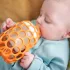 CogniKids GRIP Cumisüveg Fogó Rugalmas Fogást Segítő Markolattal Tangerine
