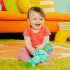 Bright Starts Tug Tunes™ Elefánt Felfüggeszthető Játék Dallamokkal C-Karikán Újszülött Kortól