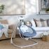 Ingenuity Chambray™ Hintázó Zenélő Hinta Újszülött Kortól - 6 Hintázási Sebesség, 8 Dallam, Összecsukható Kivitel, 9kg Súlyhatárig