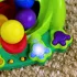 Bright Starts Poppin' Ball Frog™ Interaktív Játék 6 Hónapos Kortól - Labdapattogtató Béka Babajáték, Zenével és Fényekkel, Mozgásra Ösztönöz