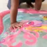 Baby Einstein Jiggling Janet Vízzel Tölthető Hasaló Játszószőnyeg