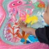 Baby Einstein Jiggling Janet Vízzel Tölthető Hasaló Játszószőnyeg