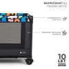 Kinderkraft Joy 2 Utazóágy Happy Shapes - Összecsukható Babaágy Vidám Mintával, Oldalsó Cipzáras Bejárattal, Kerekekkel és Hordozótáskával